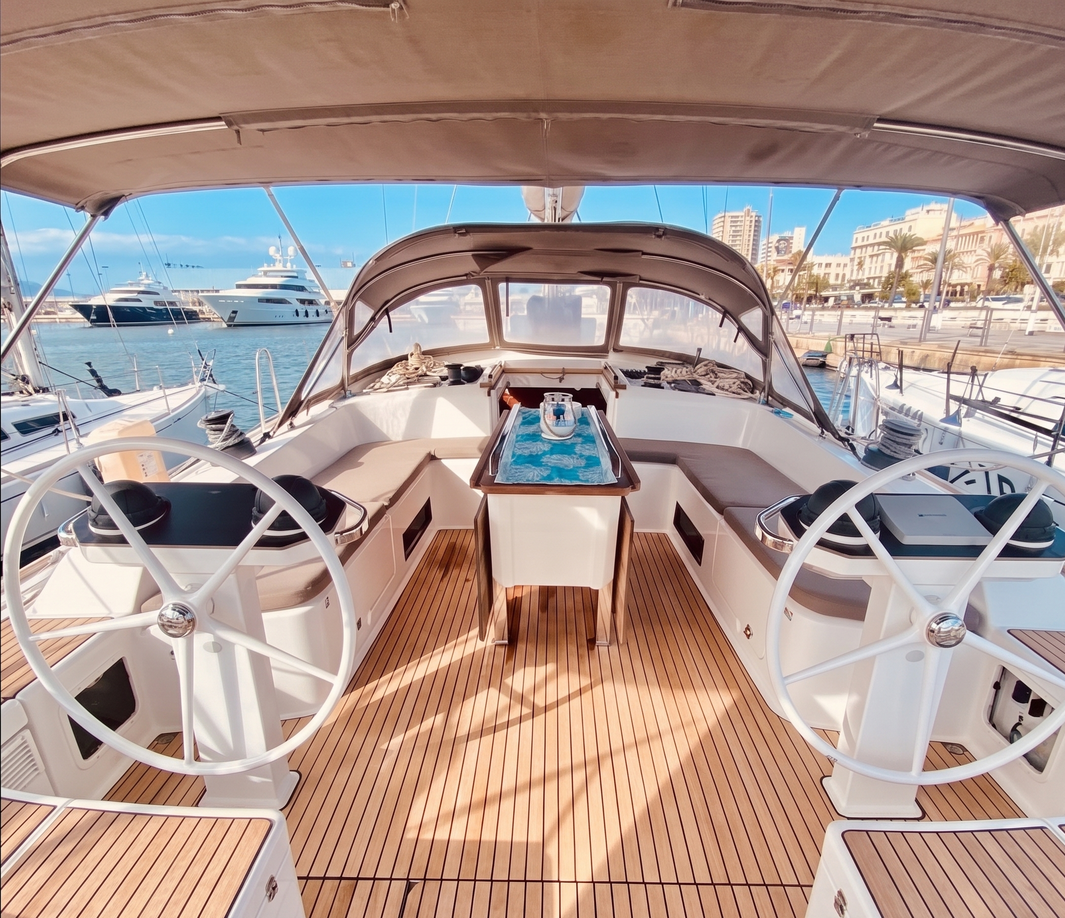 Bavaria 56 teak deck and cockpit &mdash; spacious sailing yacht for charter