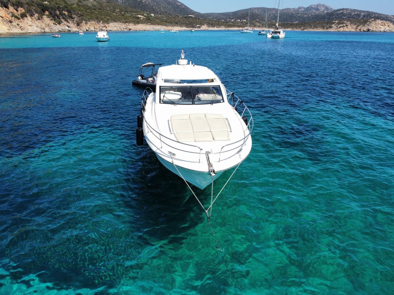 Mirage 44 bow view — luxury yacht charter from Chia