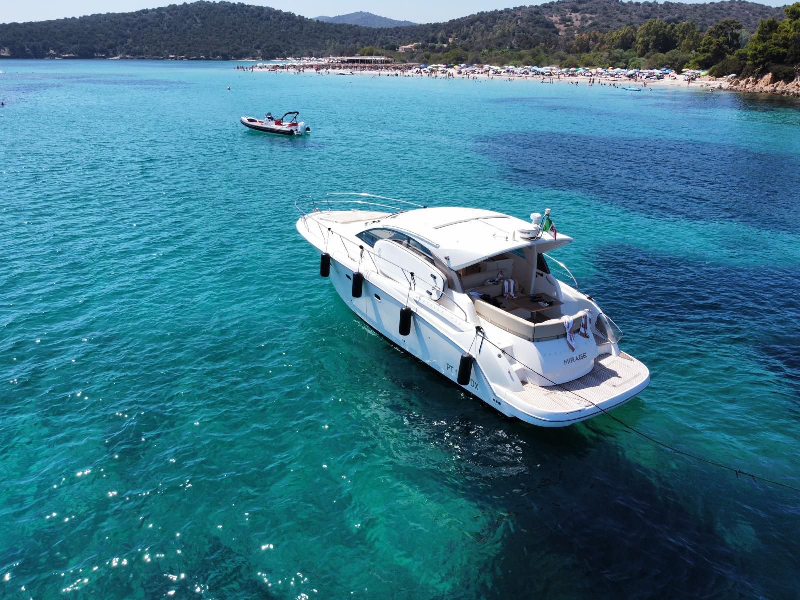Mirage 44 yacht profile view cruising along the South Sardinia coast