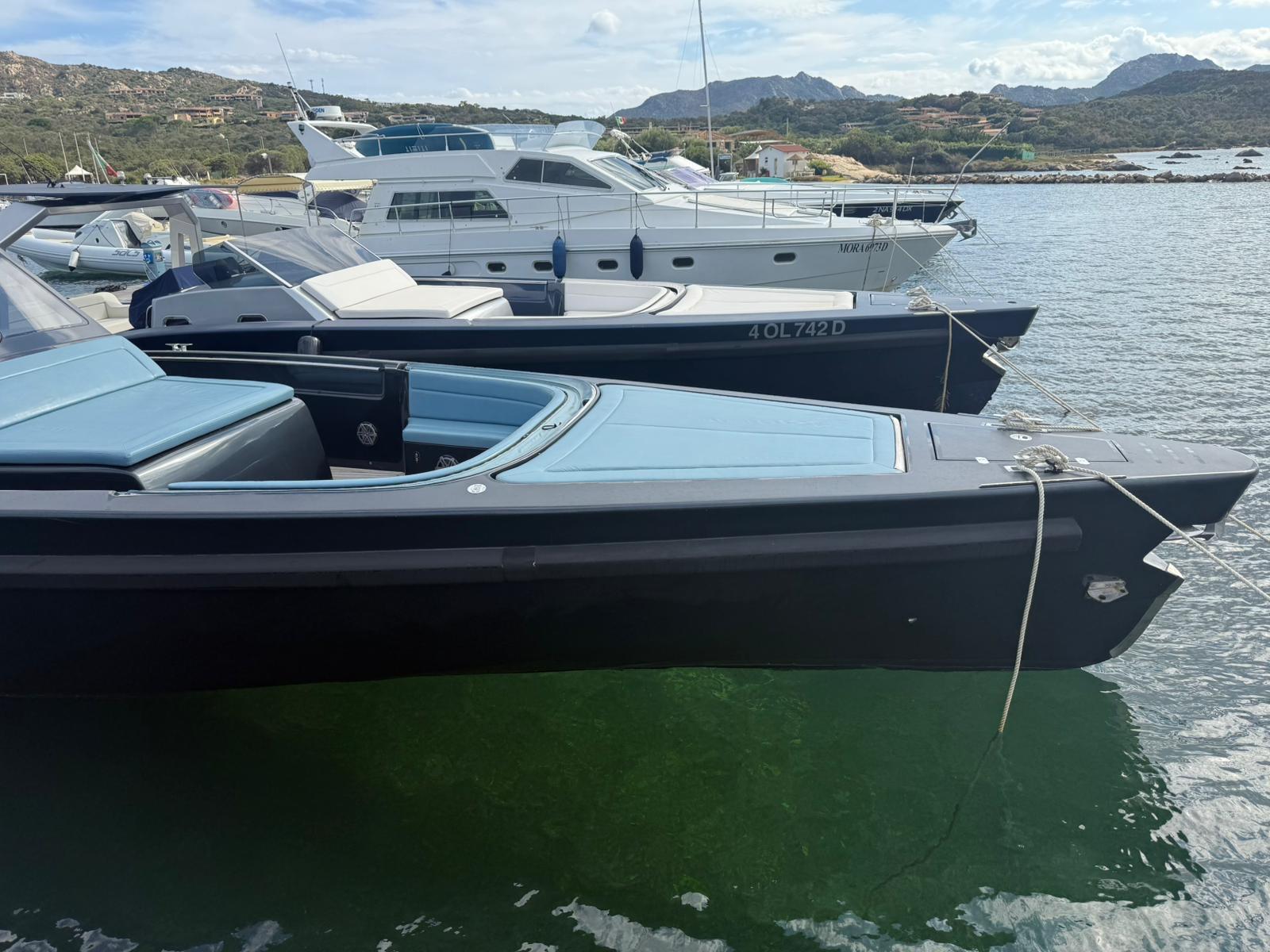 Nautilux Maori yacht aerial view in crystal-clear Sardinian waters